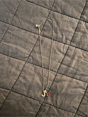 Kendra Scott Gold “J” Letter necklace with Ruby birthstone